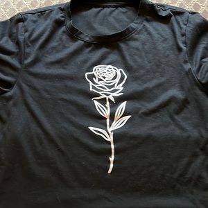 Black T-shirt with white rose on front